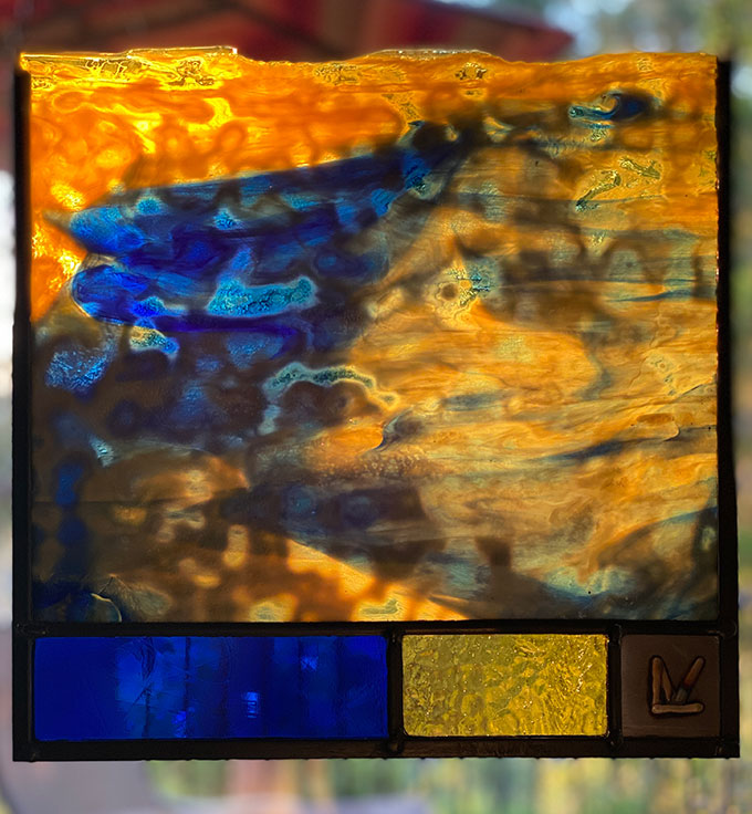 deep moody gold and blue raw edge