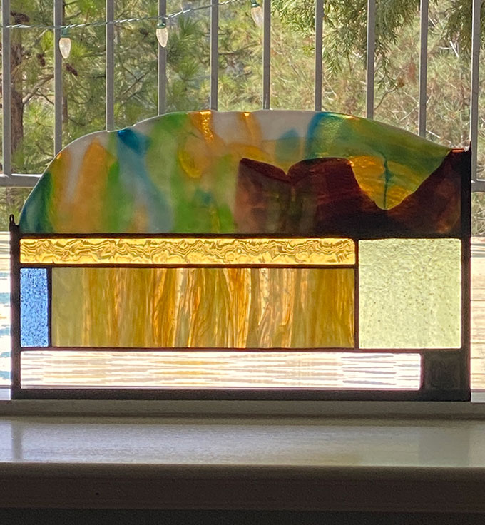 raw edge with hidden tree image in canyon